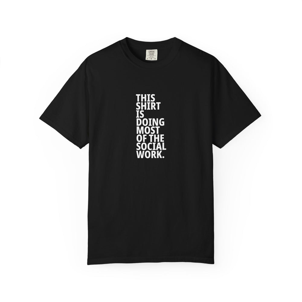 Black T-shirt with white stacked lettering reading “This shirt is doing most of the social work.” on the front.