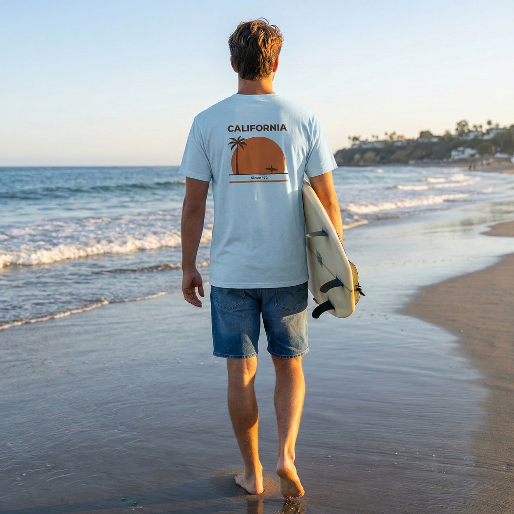 Model wearing a Blacksunset T-shirt with the "California Since '72" design, lifestyle view 1